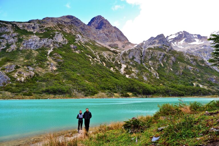 couple in esmeralda lagoon trekking in ushuaia