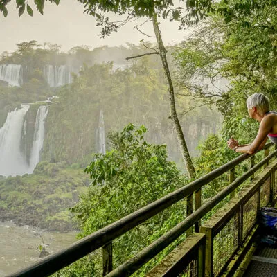 Women looking at iguazu falls
