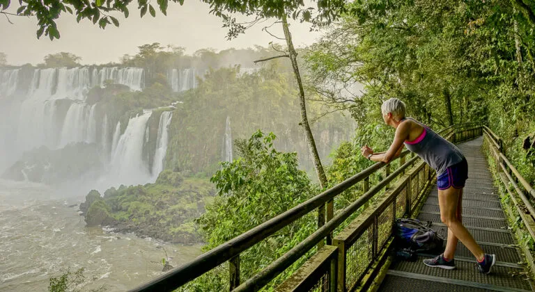 Women looking at iguazu falls