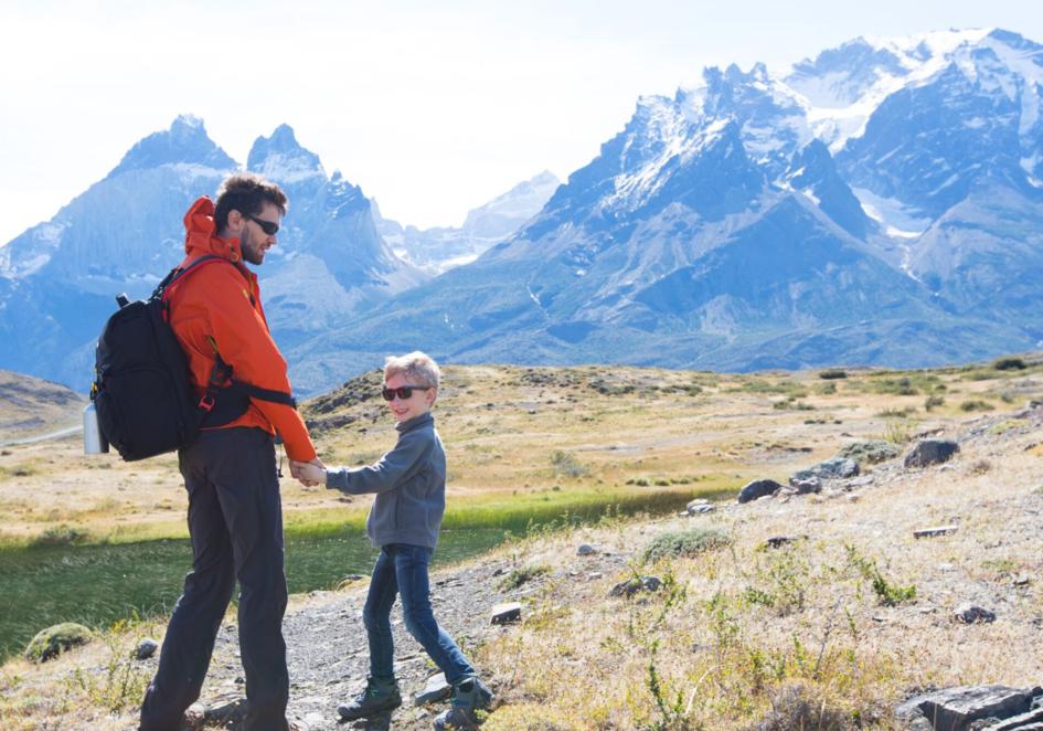 Man and kid hiking.