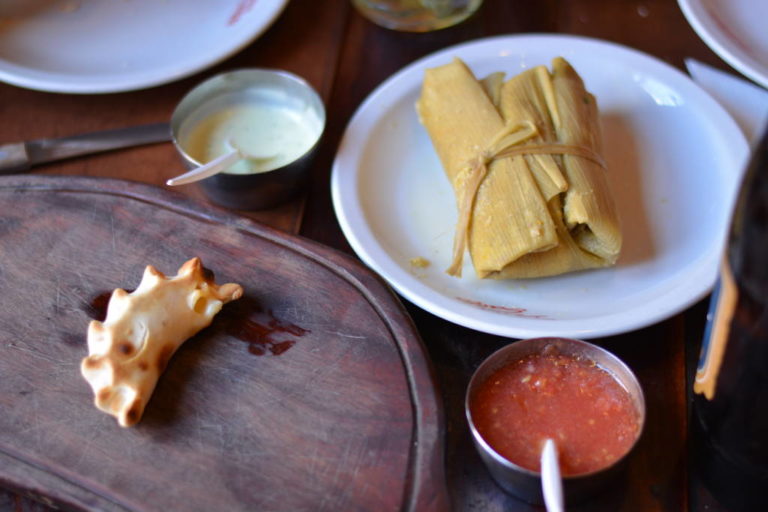 gastronomic-tour-salta One empanada and one humita, traditional dishes of North Argentina.