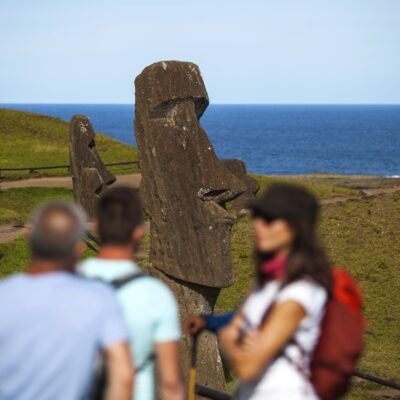 people hiking in rano kau easter island