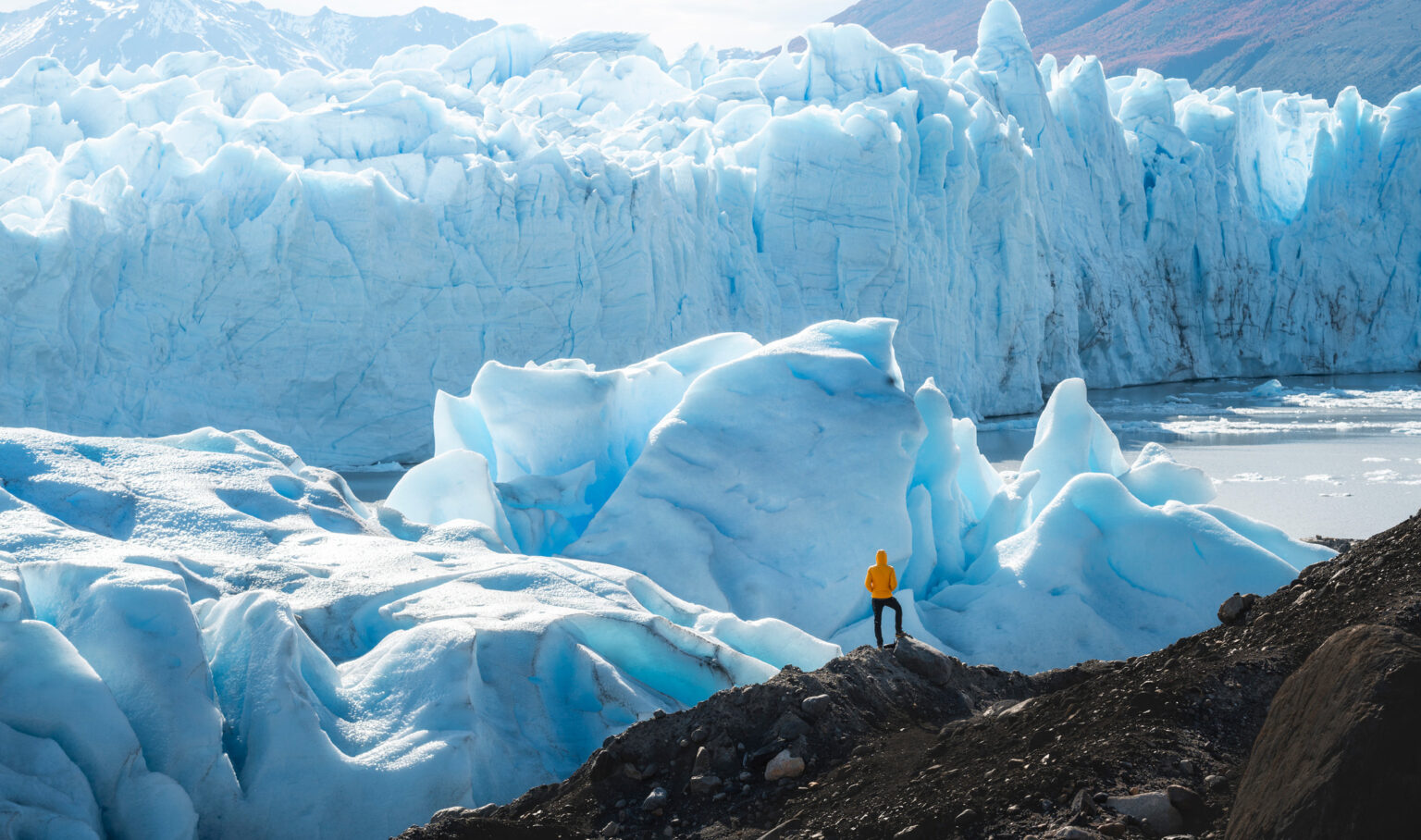A person looking at perito moreno glacier in el calafate