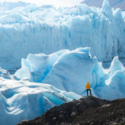 A person looking at perito moreno glacier in el calafate