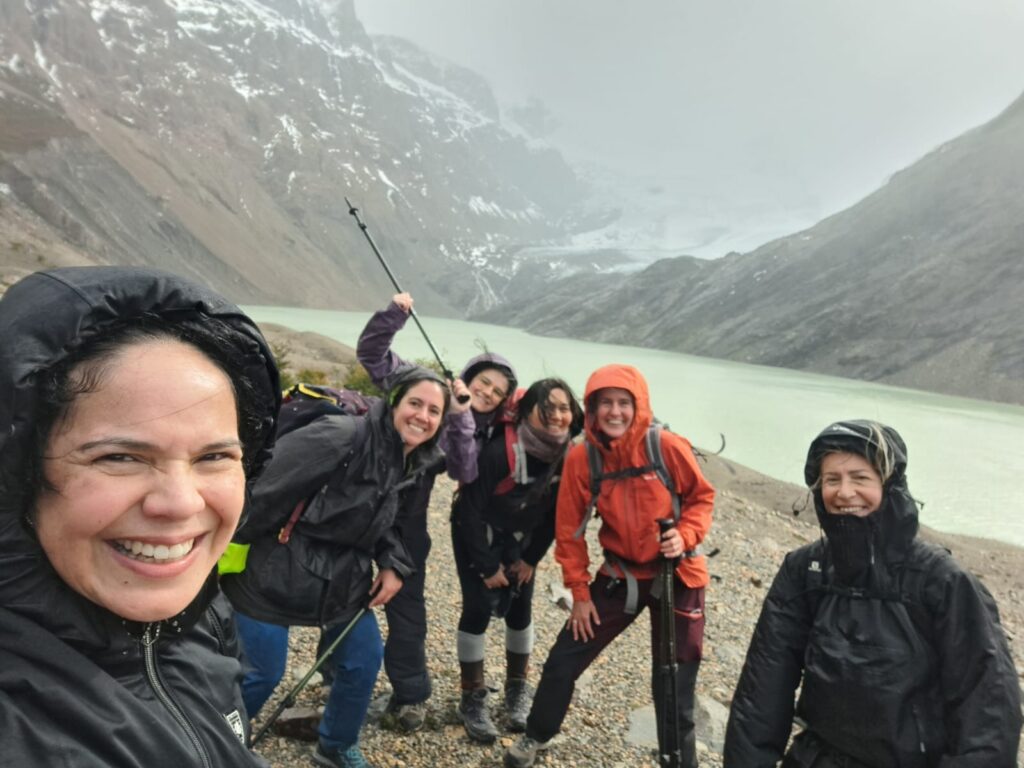 say-hueque-journeys-hiking-cagliero-glacier Group of women reaching Cagliero Glacier.