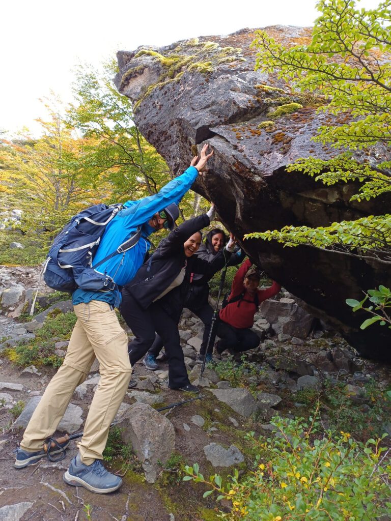 We, just having fun with a huge rock just before the summit in the hiking to Glacier Huemul, in El Chalt&eacute;n, Patagonia, Argentina. 
