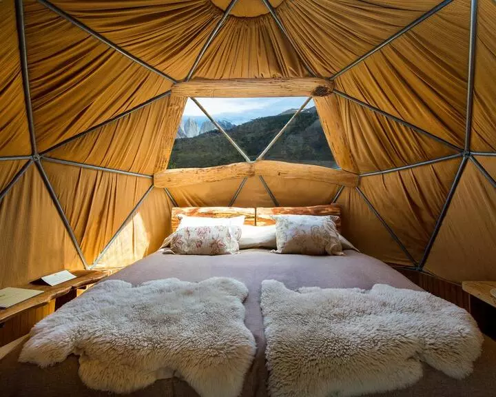 Stay in an eco lodge in the middle of Torres del Paine in Chile.